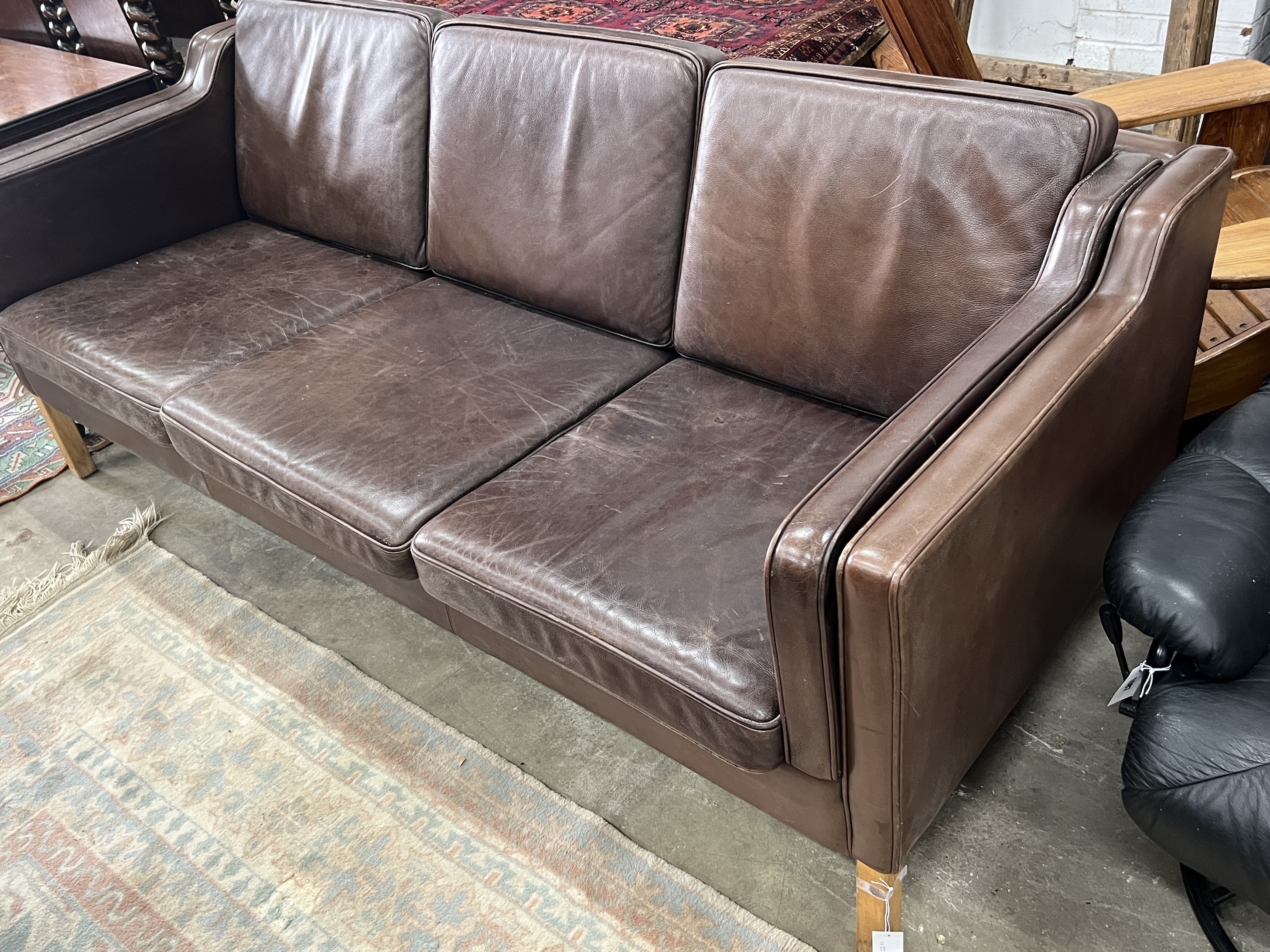 A Stouby Cognac leather three seater settee, length 202cm, width 81cm, height 78cm